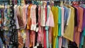 Colourful dresses display on the store.