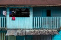 Colourful wood house closeup in the Amazon