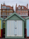 Colourful candy striped wooden beach hut on the sea front in Hove, Sussex, UK. Royalty Free Stock Photo