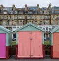 Colourful wooden beach huts on the sea front in Hove, Sussex, UK. Royalty Free Stock Photo