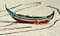 Colourful wooden fishing boats on Portugals west coast beach Royalty Free Stock Photo