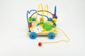 Colourful wooden toy car with string puller isolated on white background Royalty Free Stock Photo