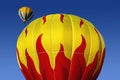 A colourful yellow and red hot air balloon show of its flame design in Portland, USA