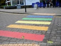 Colourful zebra crossing in blue green yellow orange and red