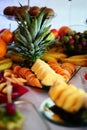 Colourfull fruit arrangement with pineaple apple and grapes Royalty Free Stock Photo