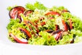 Colourfull salad on white plate