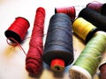 Colourfull threads red pink purple plum yellow green black Royalty Free Stock Photo