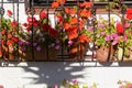 A colourfull window box with geraniums with red and pink flowers Royalty Free Stock Photo