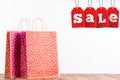 Shopping bags on wooden table Royalty Free Stock Photo