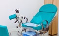 Colposcope and chair in the gynecology office. Selective focus Royalty Free Stock Photo