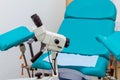 Colposcope and chair in the gynecology office. Selective focus Royalty Free Stock Photo