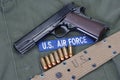 Colt goverment 1911 with us air force uniform Royalty Free Stock Photo