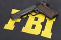 Colt m1911 handgun on fbi uniform