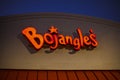 Bojangles fast food restaurant at night orange building sign