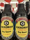 Kikkoman soy sauce in a glass jar in a retail store