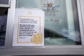 McDonalds change shortage notice in drive thru window