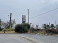 Trash and waste in an abandoned lot and an old pay phone at Belair road Royalty Free Stock Photo