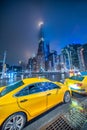 Columbus Circle skyscrapers and taxi cabs at night, Midtown Manhattan - New York City Royalty Free Stock Photo