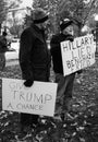 Counter Protestor Holds Anti Hillary Clinton Sign at Rally after the Election of Donald Trump