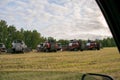 Agricultural combines are standing in the field Royalty Free Stock Photo