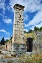 Column in Ancient Greek archaeological site of Delphi, Greece Royalty Free Stock Photo