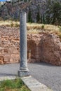 Column in Ancient Greek archaeological site of Delphi, Greece Royalty Free Stock Photo