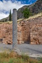 Column in Ancient Greek archaeological site of Delphi, Greece Royalty Free Stock Photo