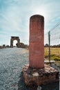 Column and Arch of Caparra, ancient roman city of Caparra in Extremadura, Spain