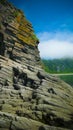 Column basalts formation of Stolbchaty cape at Kunashir, kuril islands, Russia Royalty Free Stock Photo