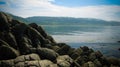 Column basalts formation of Stolbchaty cape at Kunashir, kuril islands, Russia Royalty Free Stock Photo