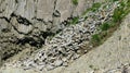 Column basalts formation of Stolbchaty cape at Kunashir, kuril islands, Russia Royalty Free Stock Photo