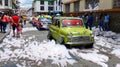 Column of classic and retro cars on carnival parade