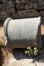 Column engraved with ancient Greek inscriptions. Ephesus ruins, Izmir. Royalty Free Stock Photo