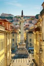 Column of Pedro IV, the monument in the centre of Rossio Square, Lisbon. Sunny morning