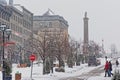 Column on Place Jacques-cartier square in Montreal in the snow