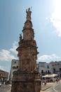 Column of Saint Oronzo in historic center of the White City of Ostuni, on a summer day in Puglia, Italy