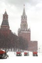 Column of snow-remover trucks on road near Kremlin