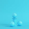 Column with soccer ball on bright blue background in pastel colo Royalty Free Stock Photo