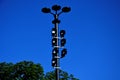 Column with special lighting for scenic lighting of public and historic buildings in city. Halogen lamps have side flaps that shad Royalty Free Stock Photo