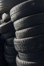 Column stack of old used car tires Royalty Free Stock Photo