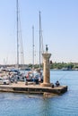 Column with a statue of a deer. Port of Mandraki Rhodes