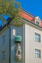 Column statue in the vase bay window. holy spirit hospital. Munich Neuhausen monument