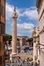 Column of Trajan Colonna Traiana aside Fori Imperiali at Foro Traiano and Piazza Venezia square in city center of Rome in Italy Royalty Free Stock Photo