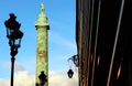 VendÃÂ´me column monument Paris with faÃÂ§ades at sunset Low angle shot Royalty Free Stock Photo