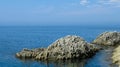 Columnar basalts formation of Stolbchaty cape in Kunashir, kuril islands, Russia Royalty Free Stock Photo