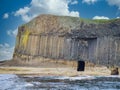 Columns of jointed volcanic basalt rocks on the island of Staffa in the Inner Hebrides, Scotland Royalty Free Stock Photo