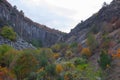 Landscape image of columnar jointing of basalt rocks and foliage in Boyabat, Sinop, Turkey, at a sunny day Royalty Free Stock Photo