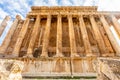 Columns of ancient Roman temple of Bacchus and blue sky in the background, Beqaa Valley, Baalbeck, Lebanon Royalty Free Stock Photo