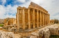 Columns of ancient Roman temple of Bacchus with surrounding ruin