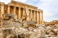 Columns of ancient Roman temple of Bacchus with surrounding ruins of ancient city, Bekaa Valley, Baalbek, Lebanon Royalty Free Stock Photo